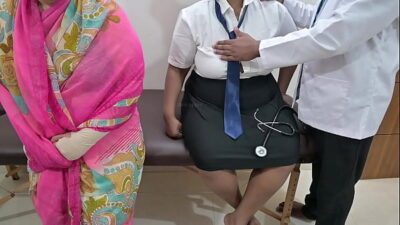 Doctor using patient infront of mom