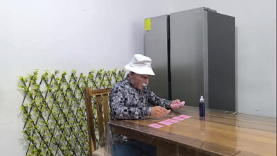 An old card player ends up fucking a beautiful young Latina. She moans sensually while being penetrated.